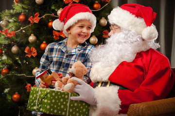 Wall Mural - Santa Claus and a little boy