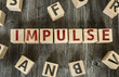 Wooden Blocks with the text: Impulse
