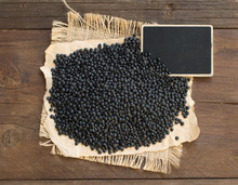 Black Lentils With A Small Chalkboard