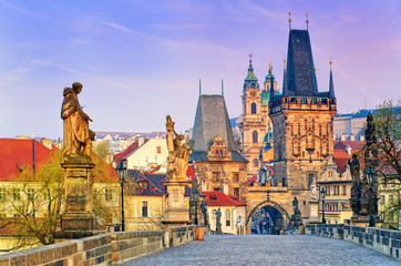 Wall Mural - Charles Bridge and the towers of the old town of Prague on sunrise, Czech Republic