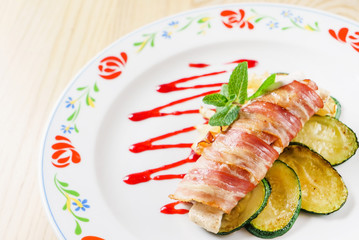 Poster - chicken roll wrapped in strips of bacon