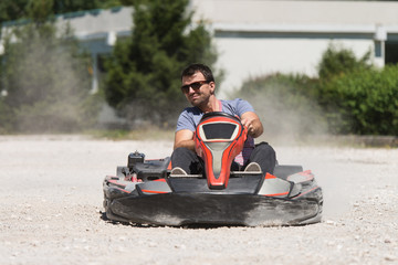 Wall Mural - Man Is Driving Go-Kart With Speed In Karting