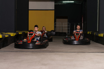 Poster - Group Of People Driving Go-Kart Karting Race