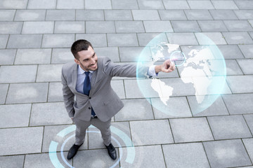 Poster - smiling businessman with globe projection outdoors