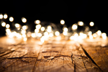 Wall Mural - Blur christmas lights on wooden planks