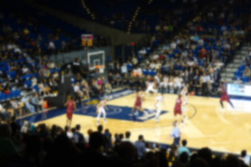 blurred background of sports arena crowd