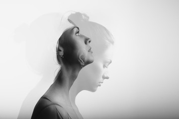 double exposure with young and beautiful girl, monochrome