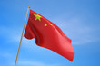 3D China flag floating in the wind on blue sky background