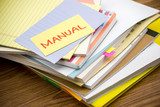 Fototapeta  - Manual; The Pile of Business Documents on the Desk