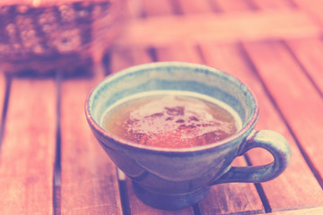 Norman apple cider in a typical ceramic cup