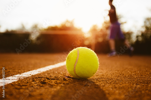 Silhouette of player on a tennis court Poster