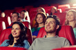 © Syda Productions - happy friends watching movie in theater