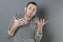 Body Language Concept - Talkative 40s Man Enjoying Discussing With Expressive Himself With Fun Hand Gesture,studio Shot On Gray Background