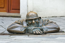 Cumil the Peeper sculpture, also known as The Watcher or Man at Work, in Bratislava, Slovakia