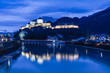 Castle Kufstein reflecting in Inn river in Austria - architecture and travel background