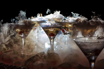 drink in glasses with the effect of dry ice