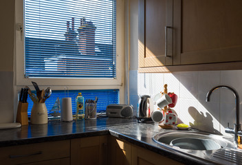 your grandparents kitchen with sun shining in through window