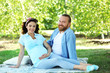 © Africa Studio - Happy moments in waiting baby's birth - man and woman together in the park