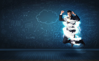 Wall Mural - Happy business man jumping with storm cloud around him