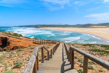 Wooden Walkway To Praia Do Bordeira Beach And Beautiful Blue Sea View, Algarve Region, Portugal