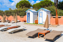 Sunbeds And Changing Booths On Beautiful White Sand Palombaggia Beach, Corsica Island, France