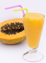 Glass of papaya juice isolated on white. Picture taken in Peru.