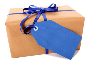 Wall Mural - Plain brown paper package or parcel, blue gift tag or label