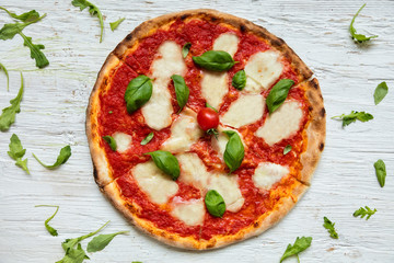 Delicious italian pizza served on wooden table