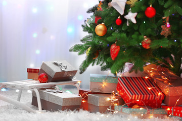 Wall Mural - Decorated room with Christmas tree and presents under it, close up