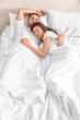 © Africa Studio - Happy couple snoozing on bed