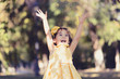 © javiindy - Little girl running and playing in the park