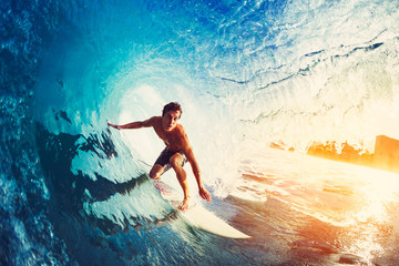surfer on blue ocean wave