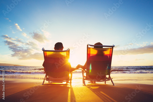 Fotografía Retirement Vacation Concept, Mature Coupe Watching the Sunset