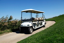 White Golf Carts At The Green Golf Course