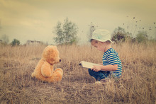 Cute Girl Reading Book Teddy Bear