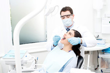 Patient Getting Treated By Orthodontist