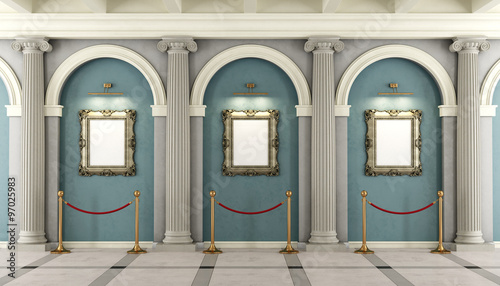 Classic museum with golden frame on wall