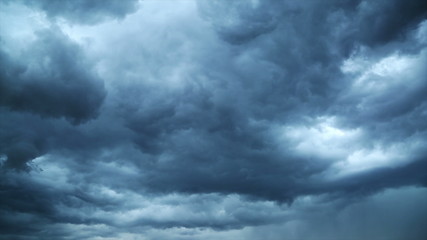 dark storm clouds are moving fast at viewer - timelapse, 4k