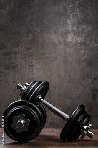 Fototapeta na wymiar Heavy black dumbbells