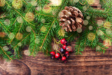 Fototapeta Tęcza - Christmas fir tree with decoration on dark wooden board.
