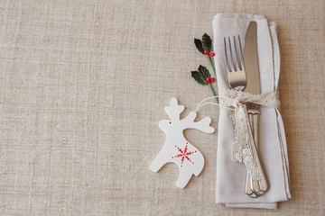 Wall Mural - Christmas table place setting, holidays copy space background, selective focus, vintage tone
