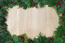 White Cedar With Red Berries Border Frame On Light Oak Wood Horizontal Background Texture