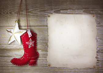 Cowboy christmas background with western toys boot and star on o