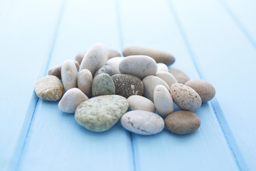 Stones isolated on wood background