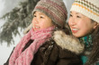 © xixinxing - Mother and daughter in snow