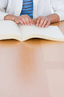 © xixinxing - Teenage boy reading a braille book