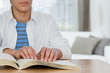 © xixinxing - Blind boy reading a braille book