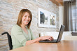 © xixinxing - Disabled woman telecommuting