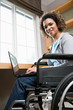 © xixinxing - Disabled woman using a laptop computer