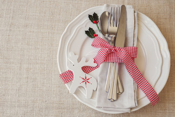 Wall Mural - Christmas table place setting, holidays copy space background